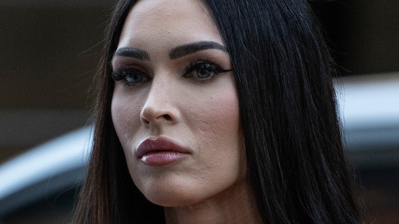 Megan Fox black hair pink lip