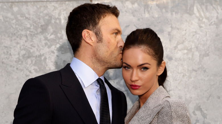 Megan Fox and Brian Austin Green attend the Giorgio Armani Fashion Show