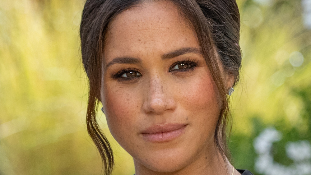 Meghan Markle staring