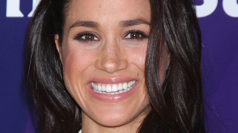 meghan markle smile hair down