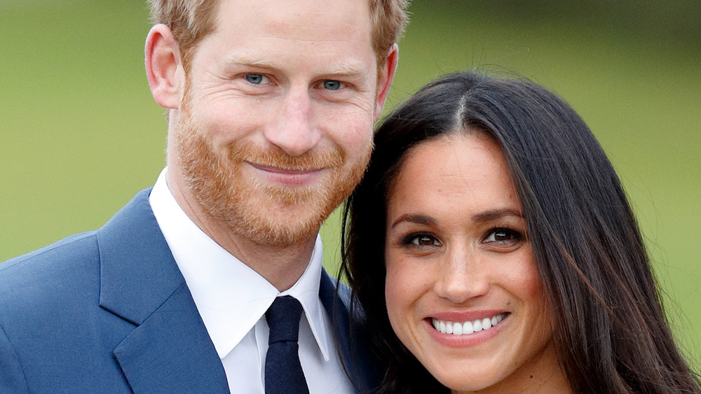 Meghan Markle and Prince Harry smiling