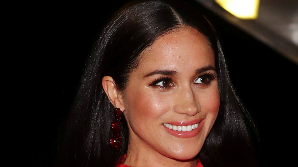 Meghan Markle smiling at Royal Albert Hall 