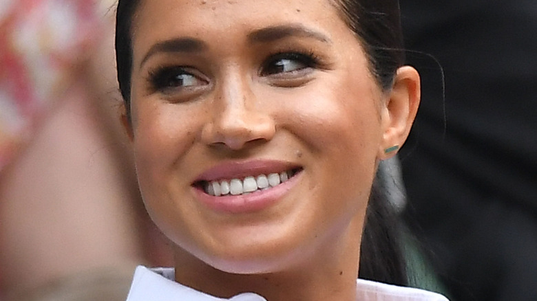 A smiling Meghan Markle