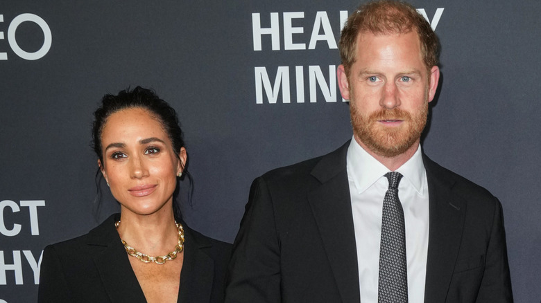 Meghan Markle and Prince Harry posing