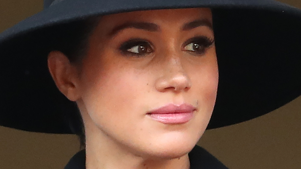 Meghan Markle wearing a hat at an event