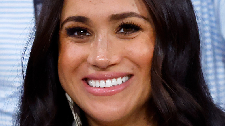 smiling Meghan Markle at 2022 Invictus Games