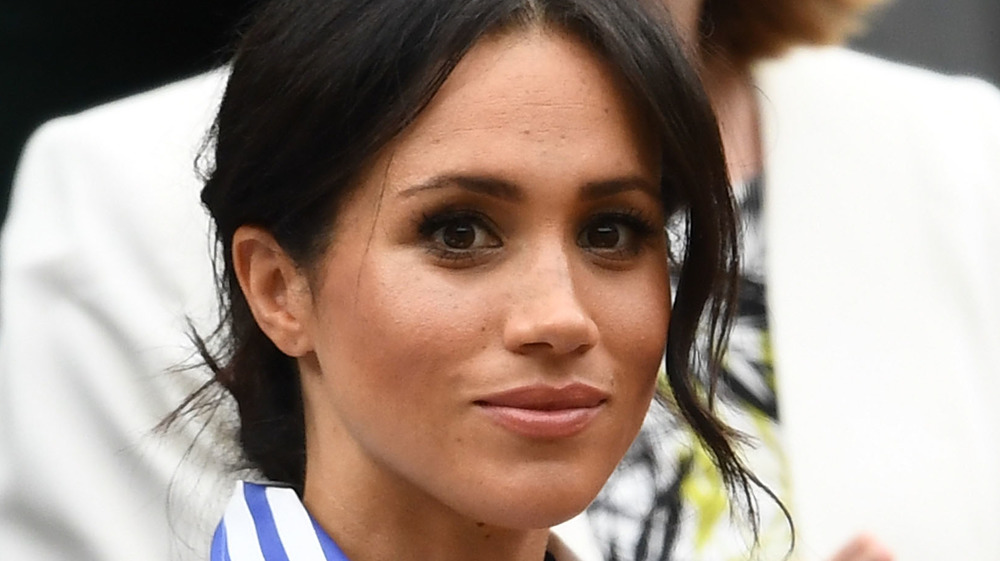 Meghan Markle looking into the crowd at an event