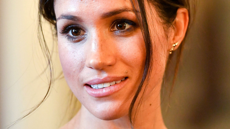 Meghan Markle staring