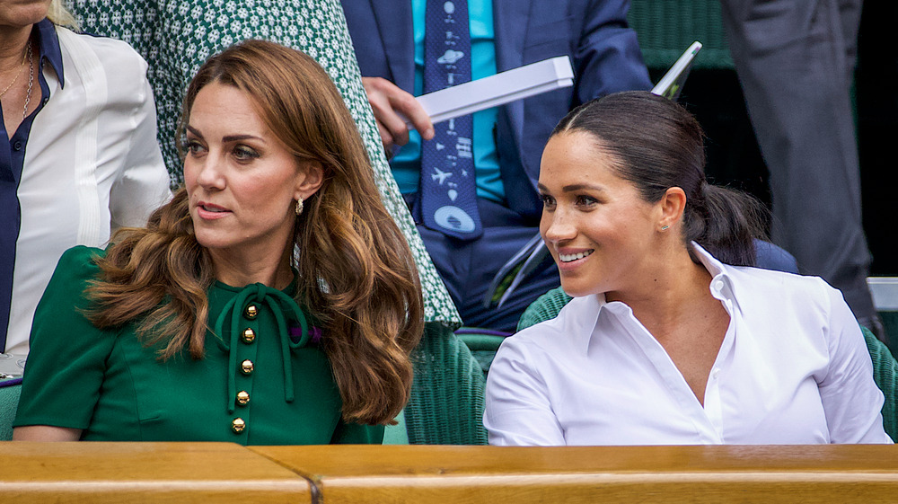 Kate Middleton and Meghan Markle at an event 