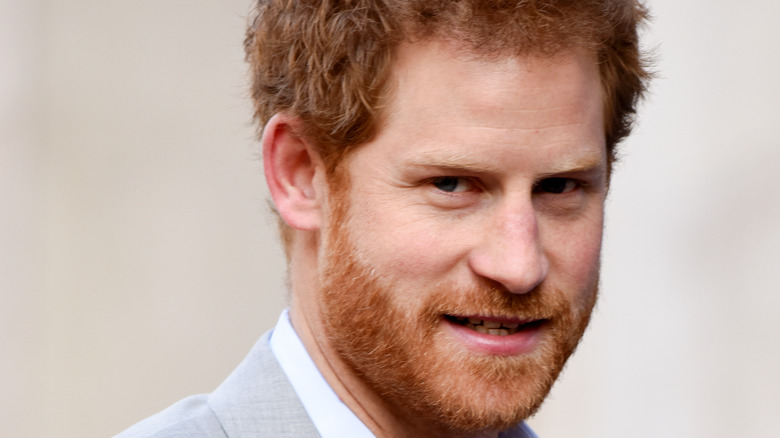 beard and gray suit