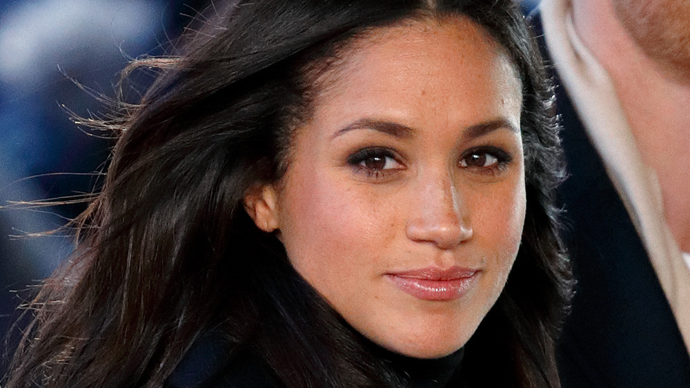 Meghan Markle in black outfit