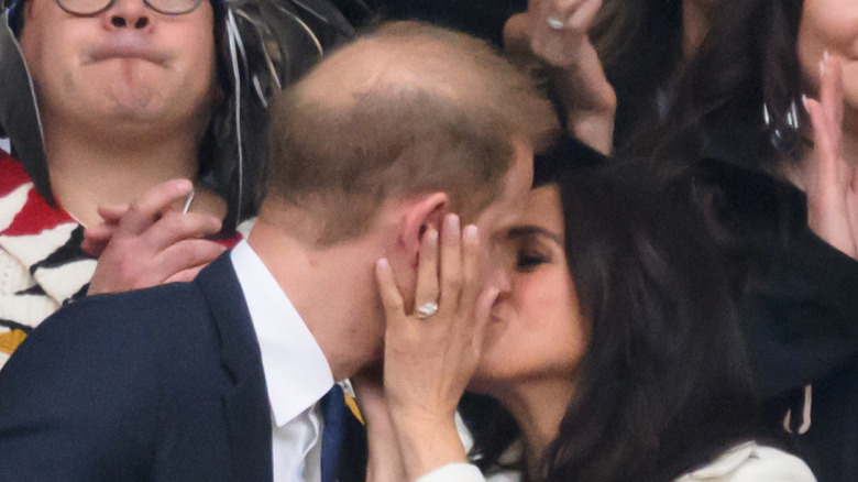 Prince Harry and Meghan Markle kissing at the Invictus Games