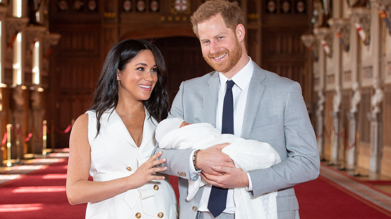Meghan Markle, Prince Harry, and Prince Archie posing