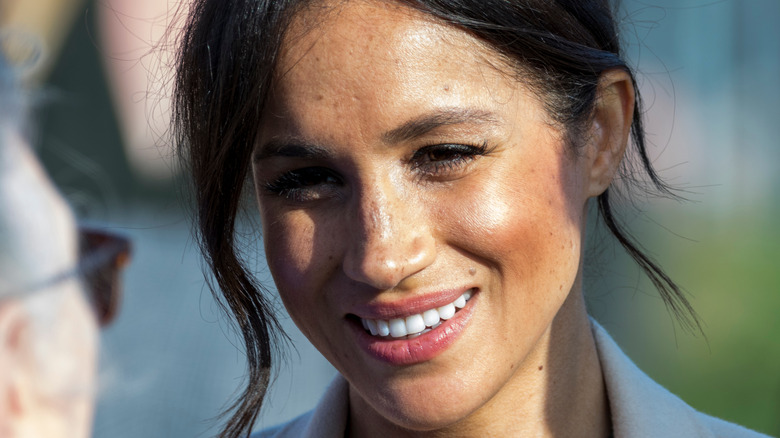 Meghan Markle looking down