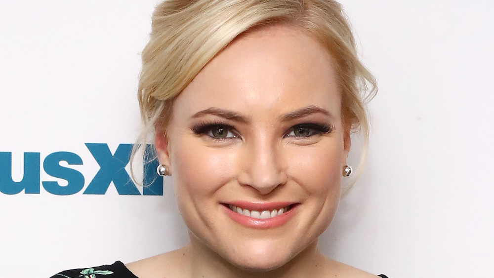 Meghan McCain smiles on the red carpet