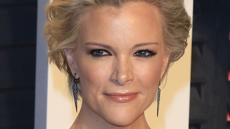 Megyn Kelly smiling and looking to the side