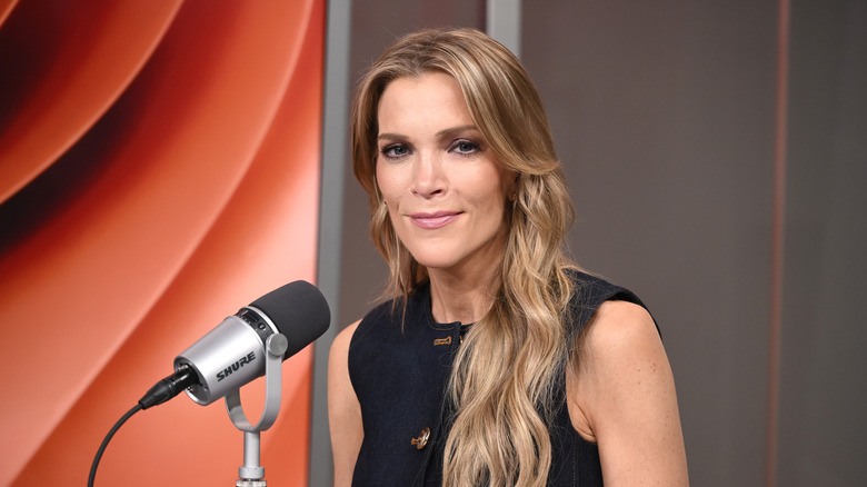 Megyn Kelly in front of a microphone