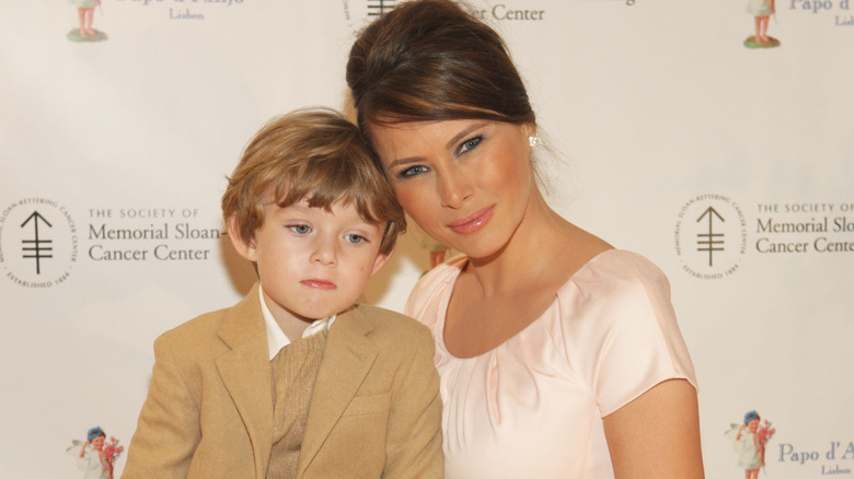 Melania Trump poses for a photo with her son Barron Trump on the red carpet
