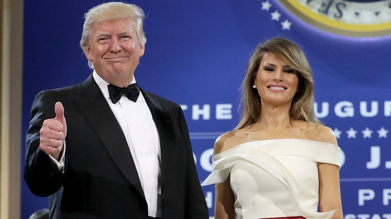 Donald and Melania Trump pose for a photo in formal wear