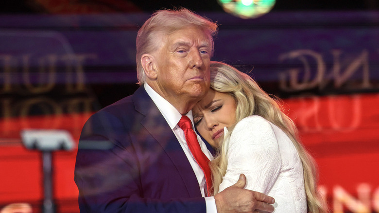 Donald Trump embracing Erika Kirk