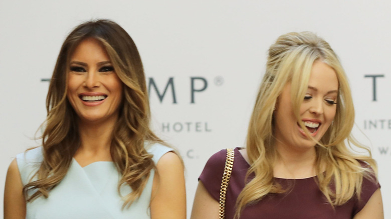 Melania trump cutting a ribbon with Tiffany Trump