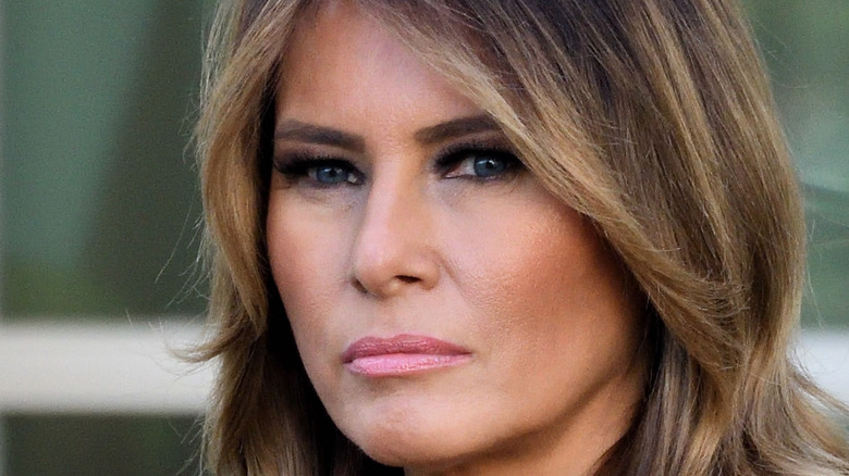 Melania Trump looks into a camera