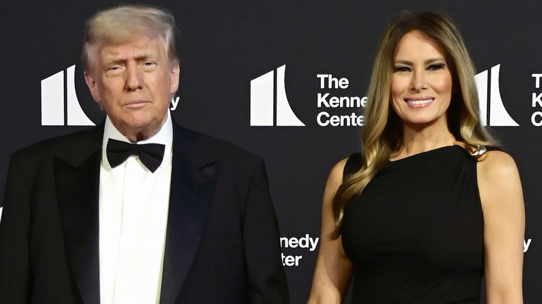 Donald Trump and Melania Trump pose in formal wear