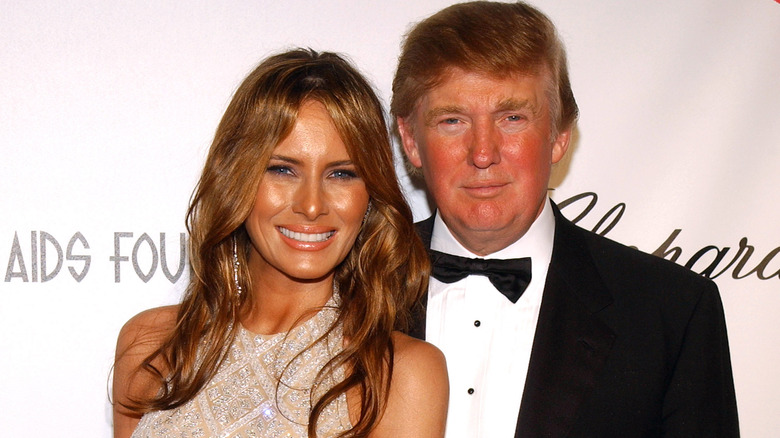 Melania Trump and Donald Trump smiling together in 2005