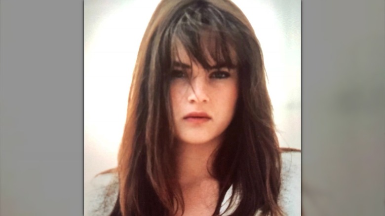 Melania Trump posing with blunt bangs