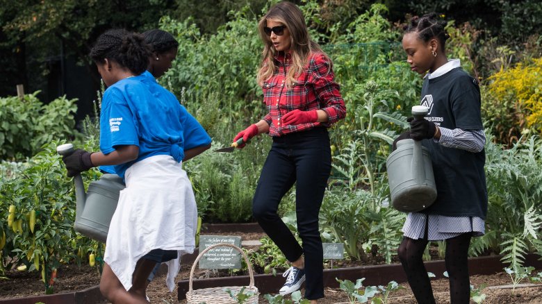 Melania Trump gardening with the Boys and Girls Club in September 2017