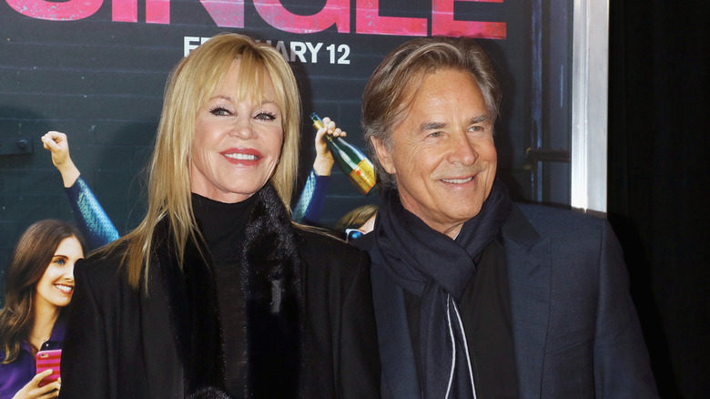 Melanie Griffith and Don Johnson at a premiere.