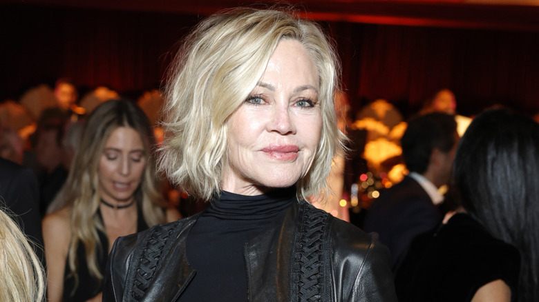 Melanie Griffith posing in 2024