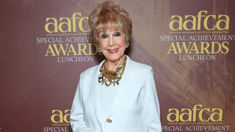 ﻿Karen Sharpe posing on the red carpet at an AAFCA luncheon in 2026