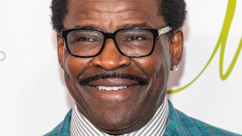 Michale Irvin with mustache and glasses