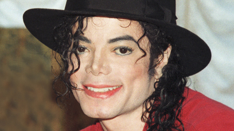 Michael Jackson with hat and red outfit