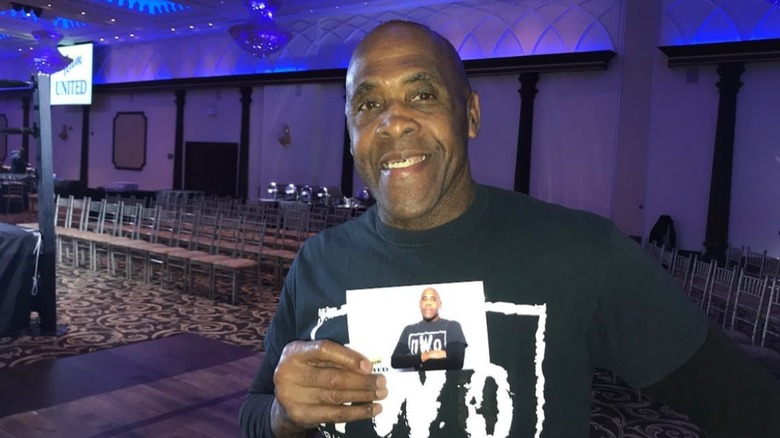 Virgil Jones holding photo