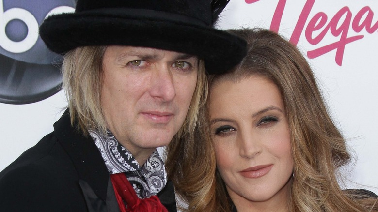 Michael Lockwood posing with Lisa Marie Presley