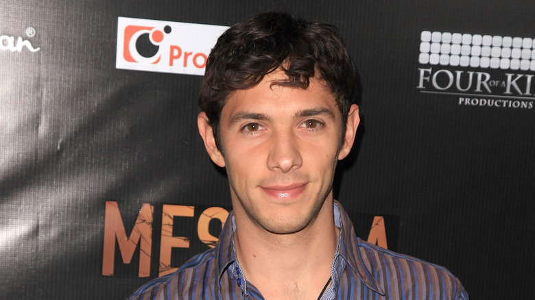 Michael Rady posing at event