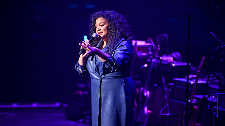 Michelle Buteau performing on stage