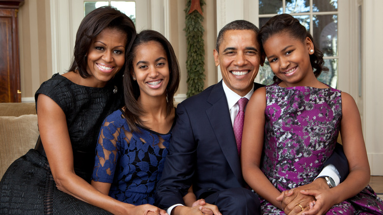Michelle, Malia, Barack, and Sasha Obama posing