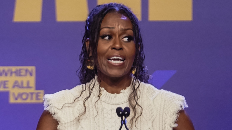 Michelle Obama speaking at podium
