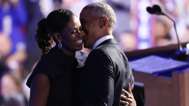 Michelle and Barack Obama laughing together