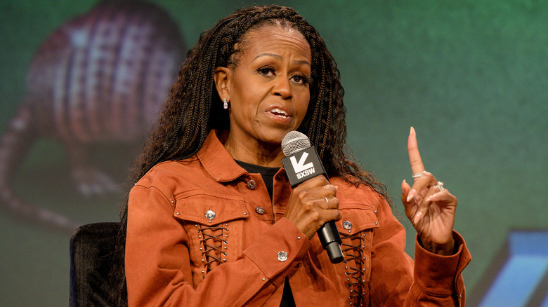 Michelle Obama with her finger up