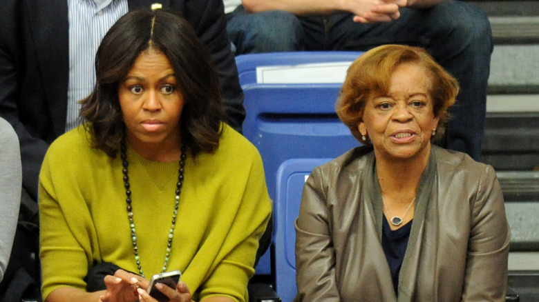 Michelle Obama and mother Marian Robinson watching a game
