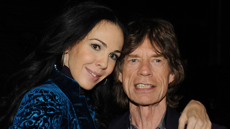 Mick Jagger and L'Wren Scott posing