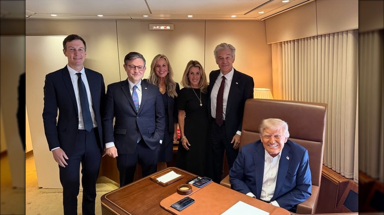 Mike and Kelly Johnson aboard Air Force One with Donald Trump