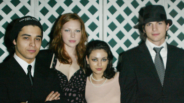 Wilmer Valderrama, Laura Prepon, Mila Kunis, and Ashton Kutcher pose side by side