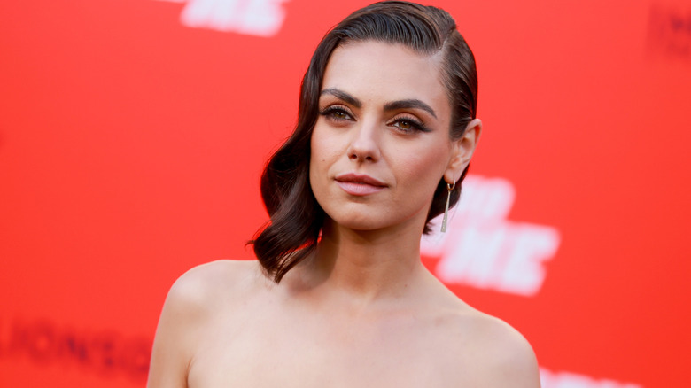 Mila Kunis posing