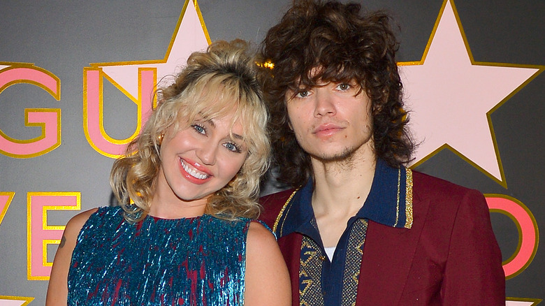 Miley Cyrus and Max Morando posing together