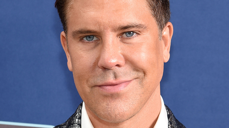 Fredrik Eklund smiles at an event